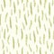 Seamless pattern with green spring branches on a cool beige background