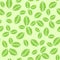 Seamless pattern with green strawberry leaves