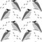 Seamless pattern with grey crows and birds tracks on the snow