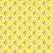 Seamless pattern with grey metallic stars on yellow illuminating background