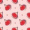 Seamless pattern with halves of juicy figs on a pink background. Brush stroke elements, grunge texture