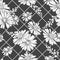 Seamless pattern with hand drawn black and white chamomiles, bluebells and leaves on abstract black background