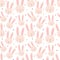 Seamless pattern of hand-drawn cute rabbits and hearts. Vector image of a hare to Valentine`s Day, lovers, prints, clothes, textil
