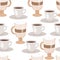 Seamless pattern with hand drawn sketchy tea and coffee cups.