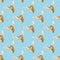 Seamless pattern of the head of a deer isolated on a blue background.