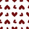 Seamless pattern of hearts made of black red check fabric