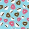 Seamless pattern of hot chocolate and donuts