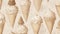 Seamless pattern with ice cream cones on old paper background