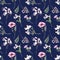 Seamless pattern with the image of beautiful wildflowers: poppy, daisy, cornflower, thistle, bells, on a dark blue background