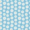 Seamless pattern with the image of daisy on a blue background.