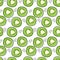 Seamless pattern with the image of kiwi slices.