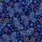 Seamless pattern images of vivid openwork butterflies and flowers on dark blue background.