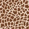 Seamless pattern. Imitation of skin of giraffe. Brown spots on beige background.