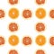 Seamless pattern of isolated slices of grapefruit and orange.