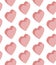 Seamless pattern isometric hearts pink