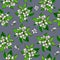 Seamless pattern with jasmine flowers painted in gouache on a blue background.