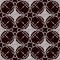 Seamless pattern of lace cloth. White ornament on a dark background.