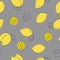 Seamless pattern of lemons in illuminating yellow pantone color of the year 2021 on ultimate gray background. Hand drawn