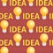 Seamless Pattern of Lightbulbs on Red Background