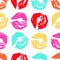 Seamless pattern of lipstick prints on a white background