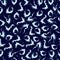 seamless pattern with long and round splashes and splashes of water on a dark blue background