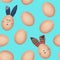 Seamless pattern made of photos of henâ€™s eggs with eggshell texture. Some eggs have Easter bunny funny faces and textile ears.