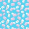 Seamless pattern.Marshmallow white and pink on on a blue background.