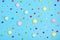 Seamless pattern of mix colorful sweets - lollipop, meringue, chocolate, sprinkle on blue background