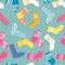 Seamless pattern with modern colorful socks. Trendy accessories in doodle style. Various cotton foot cloth. Cartoon