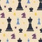 Seamless pattern with multi colored chess pieces.