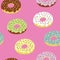 Seamless pattern with multicolored donuts.
