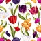 Seamless pattern with multicolored tulips, leaves, petals on white background.