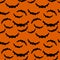 Seamless pattern orange background with black endless bat on halloween festive