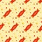 Seamless pattern with orange candies with dots on yellow board. Halloween illustration. Trendy hand drawn design