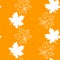 Seamless pattern of orange contoured silhouette maple leaves isolated on orange background. Simple vector texture for fabric,