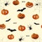 Seamless pattern with orange Halloween pumpkins carved faces, spider and bat on light orange background.