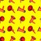 Seamless pattern of orange megaphones on yellow background isolated closeup, loudspeakers backdrop design, loudhailers ornament