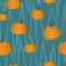 Seamless pattern of orange pumpkins on blue background