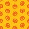 Seamless pattern with orange scary pumpkins