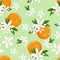 Seamless pattern with oranges fruit and white flowers on green background. Blooming citrus plant
