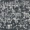 Seamless pattern of ornate Gothic letters. Monochrome repeating background