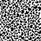 Seamless pattern, pattern, texture from random spots in the form of a leopard skin. Abstract black white conceptual background