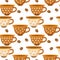 Seamless pattern, patterned coffee cups and coffee beans in brown and beige shades. Kitchen decor, textiles