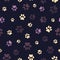 Seamless pattern with patterned paws. Complex illustration print in yellow, lilac, purple, grey and black
