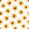 Seamless pattern with peach halves. Vector illustration.
