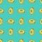 Seamless pattern with pineapple slices on bright blue background. Endless background with tropical fruit for your design