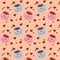 Seamless pattern with pink and blue coffee cups and chocolate hearts on a beige background. Vector illustration.