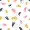 Seamless pattern with pink and golden baby footprints.