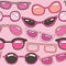 Seamless pattern with pink hand drawn sunglasses. Beauty summer texture. Perfectly look on fabric, web, textile, etc.