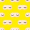 Seamless pattern from pink sleep mask with closed eyes embroidered on it with eyelashes on yellow background. Photographic collage